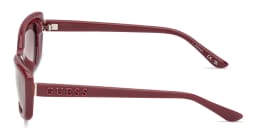 Shop Guess Embossed Logo Rectangle Sunglasses in Burgundy online.