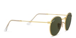 Shop Ray-Ban Round Metal Sunglasses in Gold online.